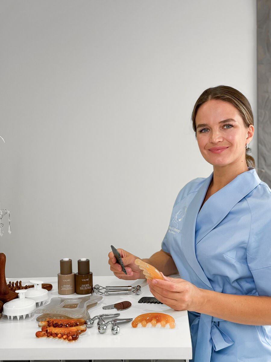 Specialist preparing facial lifting massage tools
