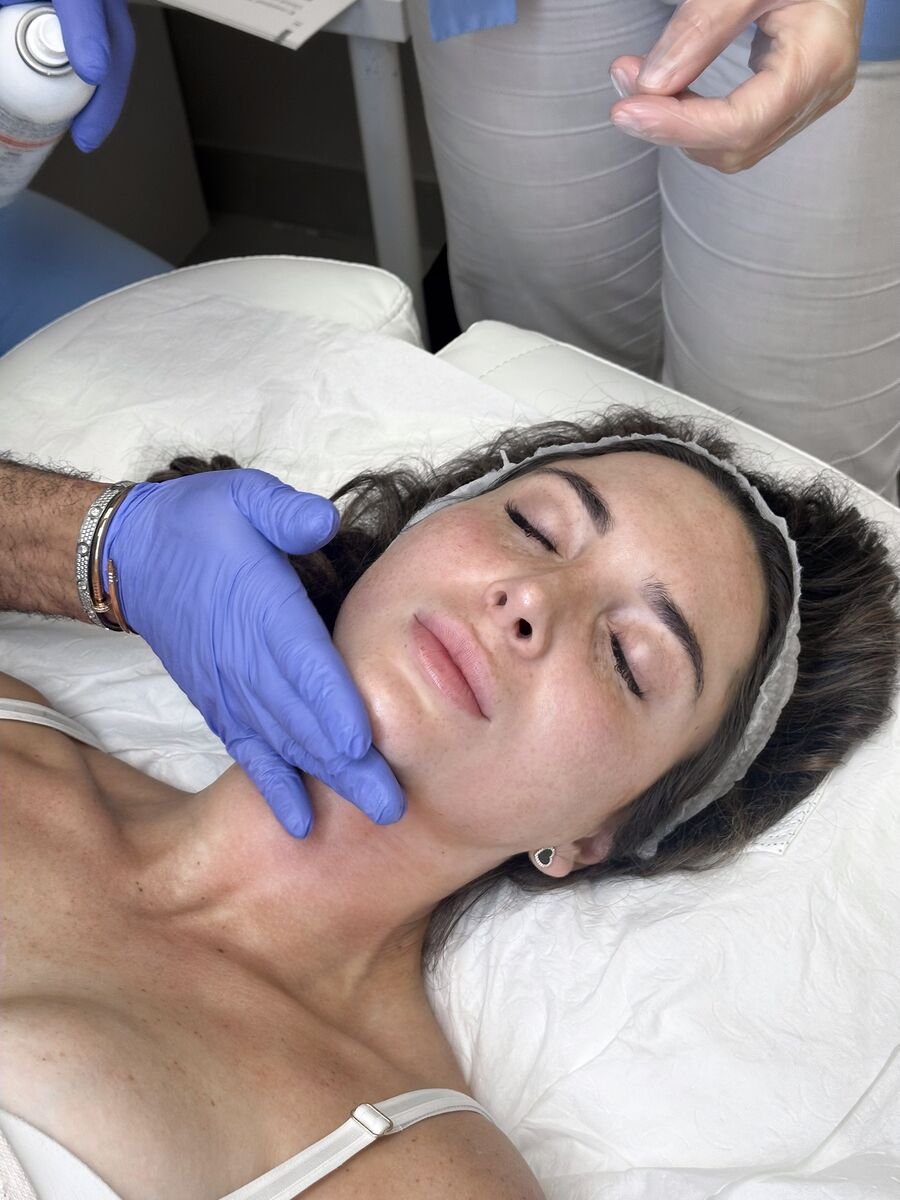 Specialist performing microneedling